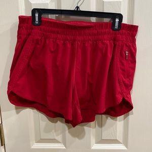 LULULEMON tracker 4 inch short, size 14, red